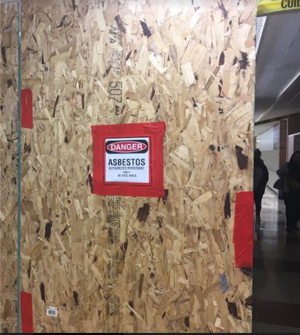 Asbestos paneling at a Washington HS hallway